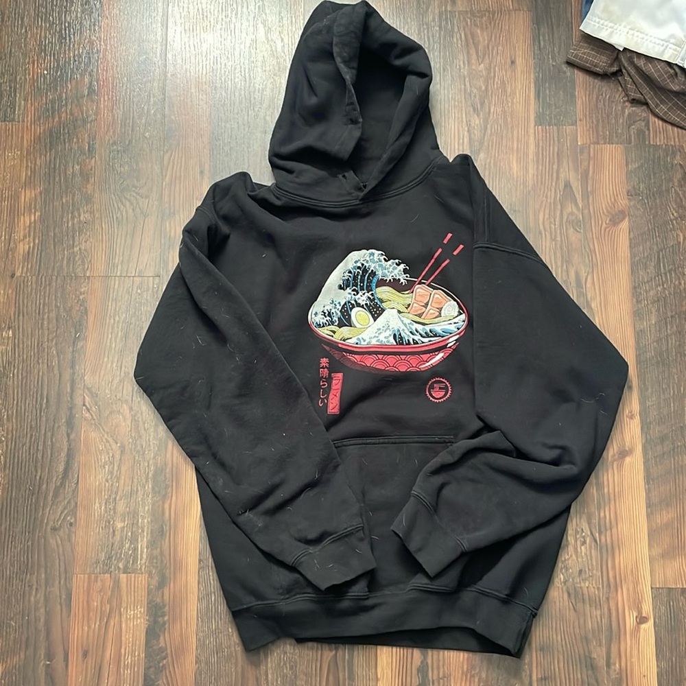 Comfy hoodie. No hood strings but still in great condition otherwise.